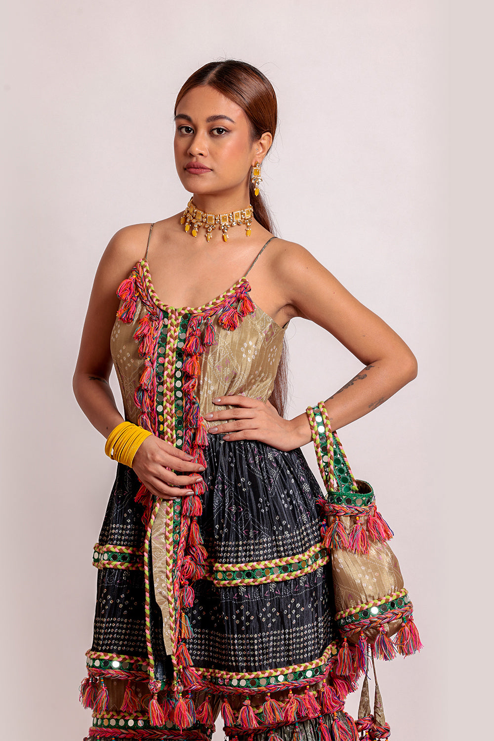 Kurta & Garara with Potli Radiant Attire with Mirror, Dori & Latkan Accents