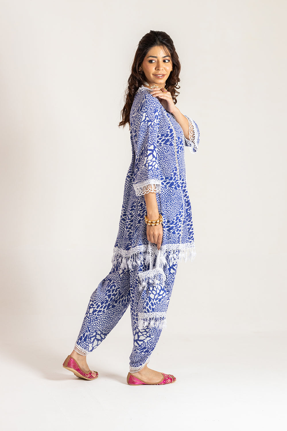 Dhoti set with Potli Bold and Beautiful Printed Attire