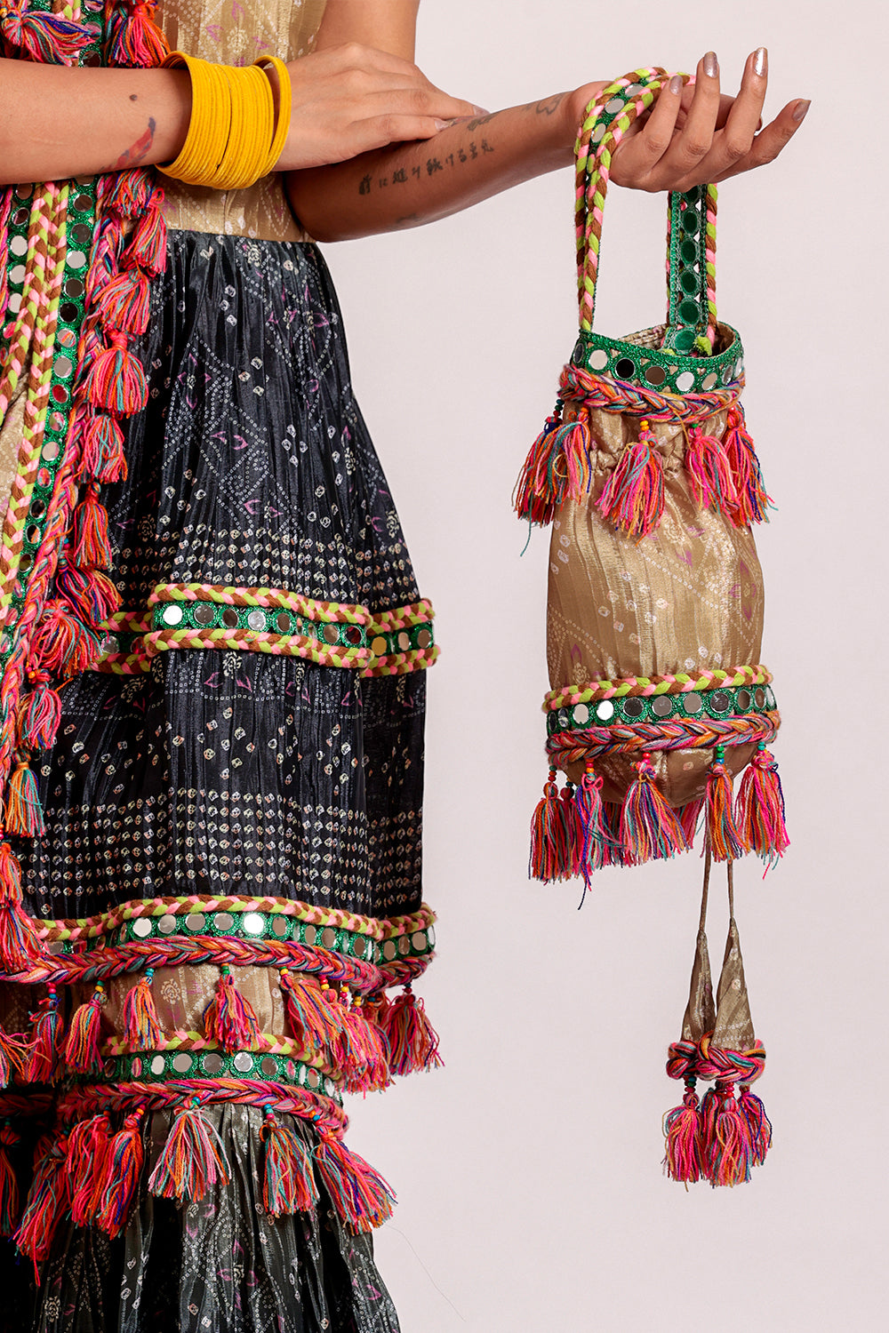Kurta & Garara with Potli Radiant Attire with Mirror, Dori & Latkan Accents