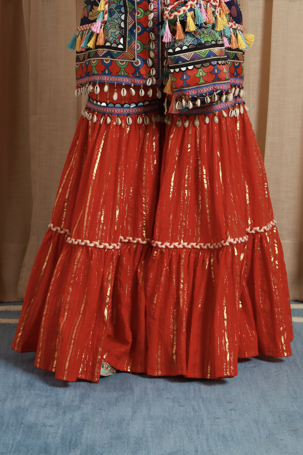 Kurta & Garara with Potli adorned with intricate detailing of shimmering shells